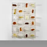 Toni Zuccheri, Set of twenty-four modular tiles, from the 'Pannelli' series, circa 1970, Stracciato a rilievi clear and coloured glass, brass