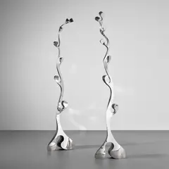 Ron Arad, Unique pair of monumental sculptures, from the 'Volume' series, circa 1988, Polished stainless steel, mild steel