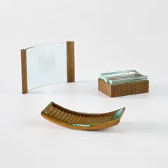 Picture frame, lidded box and cigarette box by Pietro Chiesa, late 1930s, Mahogany, walnut, cherry, glass, offered Nov 2024