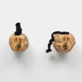 Romuald Hazoumè, Frappé, 2000, plastic, fabric and metal, in 2 parts