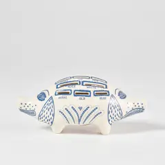 Grayson Perry, Piggy Bank, 2017, White ceramic piggy bank painted in blue and glazed, with rubber stopper, contained in the original cardboard box