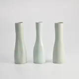 Three Bottles by Edmund de Waal, 2002, porcelain with celadon glaze, sold Apr 2024