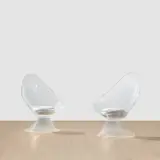 Pair of 'Lily' chairs by Erwine Laverne and Estelle Laverne, 1960, acrylic and fabric, sold Jun 2024