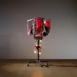 Haegue Yang, Series of vulnerable arrangements, a pair of halves, 2009, clothing rack, casters, metal arms, aluminium Venetian blinds, light bulbs, shoes, rope, metal strainer, metal rings, rubber ring mat, baskets, bells, stainless steel streamer, fly swatters, whistle and plastic funnels​