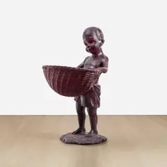 Kara Walker, African Boy Attendant Curio with Molasses and Brown Sugar, 2014, cast pigmented polyester resin with polyurethane coating with molasses and brown sugar ​