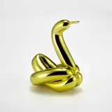 Jeff Koons, Balloon Swan (Yellow), 2017, Porcelain multiple painted in chrome, contained in the original Styrofoam-lined box with silver printed signature