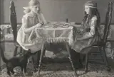 Marguerite Stuber Pearson, Two Girls at Table, Oil on canvas, in grisaille