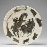 Corrida (Bullfight) (A.R. 182) by Pablo Picasso, 1953, White earthenware round dish painted in black with partial brushed glaze, sold Dec 2023