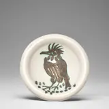 Oiseau à la huppe (Bird with Tuft) (A.R. 173) by Pablo Picasso, 1952, White earthenware round ashtray painted in black with partial brushed glaze, sold Dec 2023