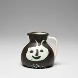 Têtes (Heads) (A.R. 367) by Pablo Picasso, 1956, White earthenware turned pitcher painted in black with partial brushed glaze, sold Dec 2023