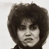 Puerto Rican woman with a beauty mark, N.Y.C. by Diane Arbus, 1965, Gelatin silver print, printed later by Neil Selkirk, sold May 2023