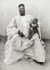 Untitled (Father and daughter, Bamako) by Seydou Keïta, 1949-1951, Gelatin silver print, printed 1998, mounted, sold May 2023