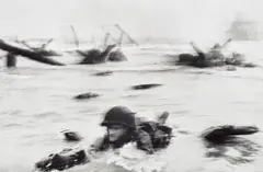 D-Day Landing, Omaha Beach, Normandy by Robert Capa, 1944, Gelatin silver print, printed 2016, sold May 2023
