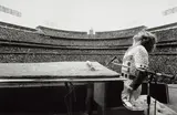 Elton John Performing at Dodger Stadium, Los Angeles by Terry O'Neill, 1975, Gelatin silver print, printed later, sold May 2023