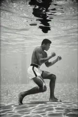 Ali Underwater by Flip Schulke, 1961, Gelatin silver print, mounted, printed later, sold Nov 2023