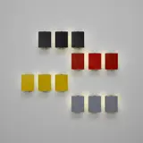 Twelve adjustable wall lights by Charlotte Perriand, circa 1963, Painted steel, sold Jan 2023