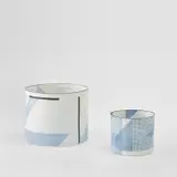 Bodil Manz, Two cylinders, from the 'Architectural Volume' series, circa 2006, Cast porcelain with high-fired transfers