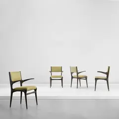 Set of four armchairs, model no. 585 by Carlo De Carli, circa 1955, Stained chestnut, fabric, sold Jan 2023