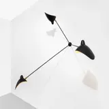 Serge Mouille, Three-armed wall light, circa 1955, Painted steel, painted aluminium, brass