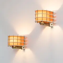 Paul Dupré-Lafon, Pair of wall lights, designed circa 1949, produced circa 1955, Painted steel, brass, paper