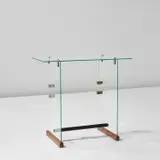 'Dattilo' desk, designed for the Vetrocoke offices, Milan by Gio Ponti, circa 1939, Glass, oak, nickel-plated brass, rubber-covered metal, sold Apr 2023