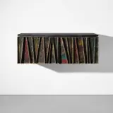 'Deep Relief' wall-mounted cabinet, model no. PE-19 by Paul Evans, 1971, Painted and patinated bronze and steel, cleft slate, painted wood, mirrored glass, glass, sold Apr 2023