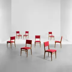 Set of eight dining chairs, model no. 671 by Carlo De Carli, circa 1957, Walnut, fabric, sold Apr 2023