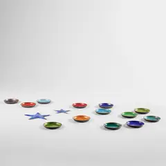 Group of thirteen coasters and two stars by Paolo De Poli, circa 1960, Enamelled copper, sold Apr 2023