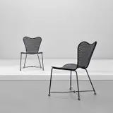 Jean Royere, Pair of chairs, circa 1955, Painted steel, brass