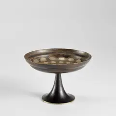 Footed cup by Jean Dunand, circa 1912, Patinated and partially silvered metal, sold Oct 2023