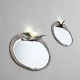 Albert Cheuret, Pair of 'Cigogne' illuminated mirrors, circa 1925, Silvered bronze, mirrored glass, alabaster