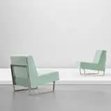 Pierre Guariche, Pair of 'Courchevel' lounge chairs, circa 1959, Chrome-plated metal, fabric