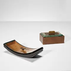 Two lidded boxes by Pietro Chiesa, circa 1938, Teak, stained fruitwood, fruitwood, glass, brass, leather, offered Oct 2023