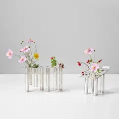 Two flower and candle holders (one prototype) by Gio Ponti, circa 1956, Silver-plated brass, sold Oct 2023