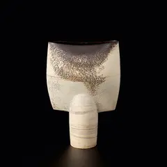 Hans Coper, Large 'Spade' form, circa 1967, Stoneware, layered white porcelain slips and engobes over a textured and incised body, the lip and interior with a manganese glaze