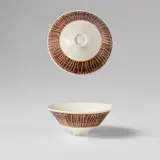 'All debts cancelled' bowl by Lucie Rie, 1949, Porcelain with shiny white glaze, the lip with a sgraffito personalisation through a band of manganese glaze, sold Nov 2023