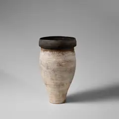 Large early vase by Hans Coper, circa 1956, Stoneware, layered porcelain slips and engobes over a textured and incised body, the lip and interior with a manganese g, sold Nov 2023
