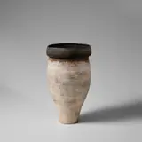 Hans Coper, Large early vase, circa 1956, Stoneware, layered porcelain slips and engobes over a textured and incised body, the lip and interior with a manganese glaze