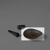 Oval dish by Lucie Rie, circa 1968, Stoneware, manganese glaze with grid sgraffito, sold Nov 2023