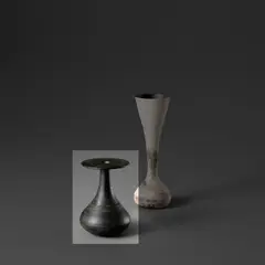 Small bottle with disc top by Hans Coper, circa 1965, Stoneware, black glaze over a textured and incised body, sold Nov 2023