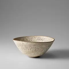Large bowl by Lucie Rie, circa 1960, Stoneware, white pitted glaze, sold Nov 2023