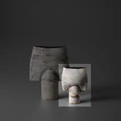 'Spade' form by Hans Coper, circa 1965, Stoneware, layered porcelain slips and engobes over a textured and incised body, the interior with a manganese glaze, sold Nov 2023