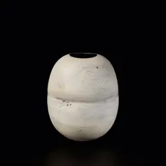 Large pot with indents by Hans Coper, circa 1975, Stoneware, layered porcelain slips and engobes over a textured and incised surface, four central indents, the interior w, sold Nov 2023