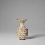 Vase with fluted body and flaring lip by Lucie Rie, circa 1974, Stoneware, pitted glaze with integral speckle, sold Nov 2023