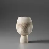 Hans Coper, Footed pot with four indents, 1975, Stoneware, layered white porcelain slips and engobes over a textured and incised body, the interior with a manganese glaze