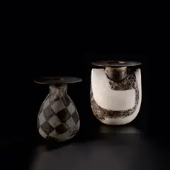 Hans Coper, 'Sack and Disc' form, circa 1972, Stoneware, layered porcelain slips and engobes over a textured body with painted design, the disc and interior with manganese glaze
