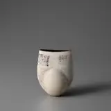 Hans Coper, Pot with spherical volume, flattened oval cylinder and internal stem holder, circa 1975, Stoneware, layered porcelain slips and engobes over a textured and incised body, the interior with a manganese glaze