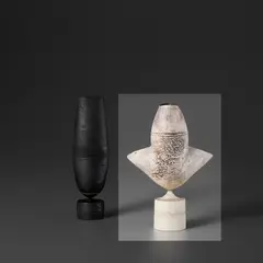 White 'Cycladic Arrow' form by Hans Coper, circa 1972, Stoneware, layered porcelain slips and engobes over a textured and incised body, the interior with a manganese glaze, sold Nov 2023