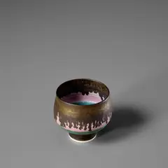 Small footed bowl by Lucie Rie, circa 1980, Porcelain, pink inlay, turquoise and gold glazes, sold Nov 2023
