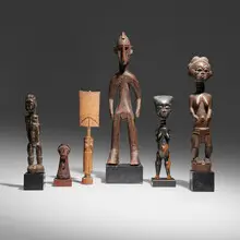 Collection of six figures by African, carved wood, beads, hair, sold Jul 2025